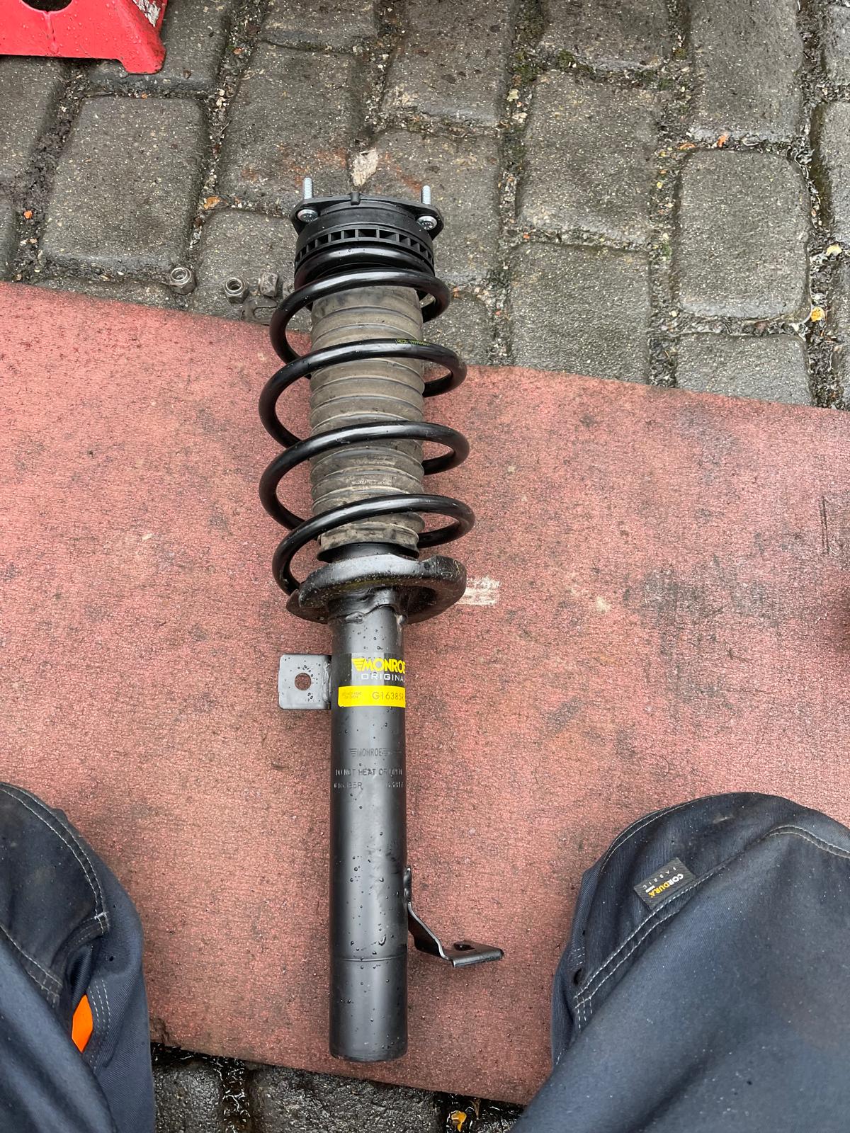 Coil spring replacement carried out by a mobile mechanic